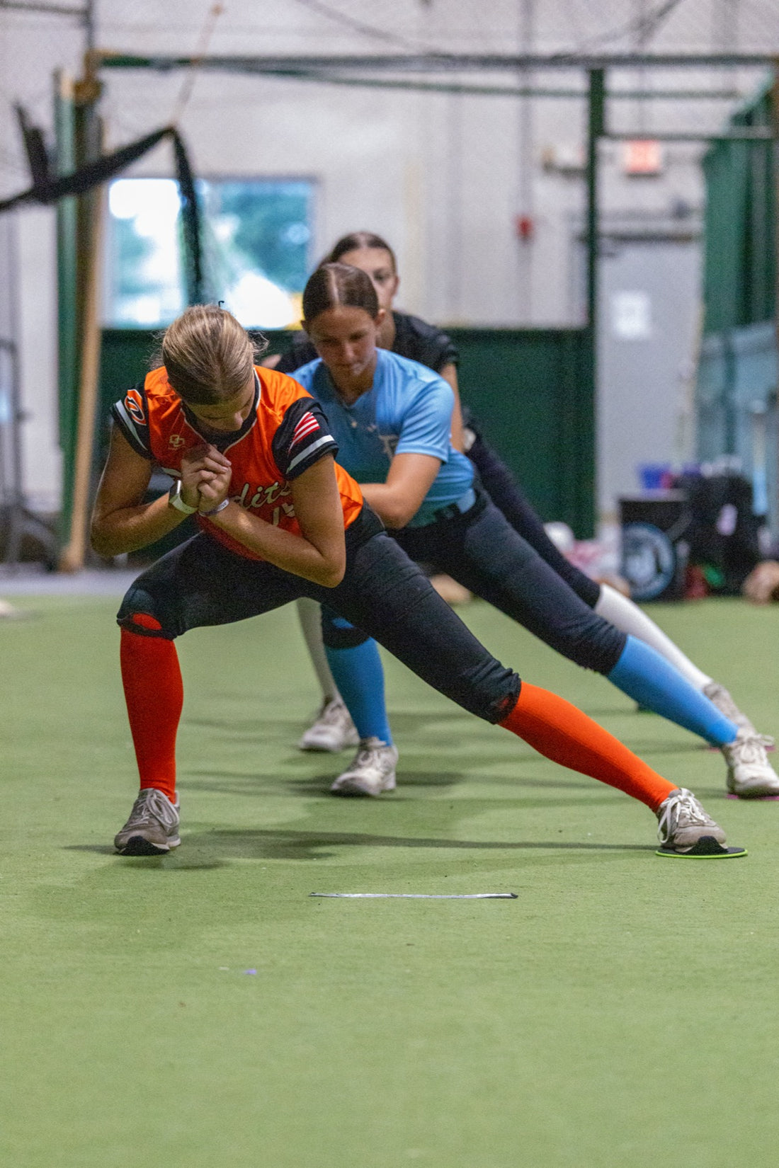 Athletes working through throwing patterns during an in-season High Level Throwing session